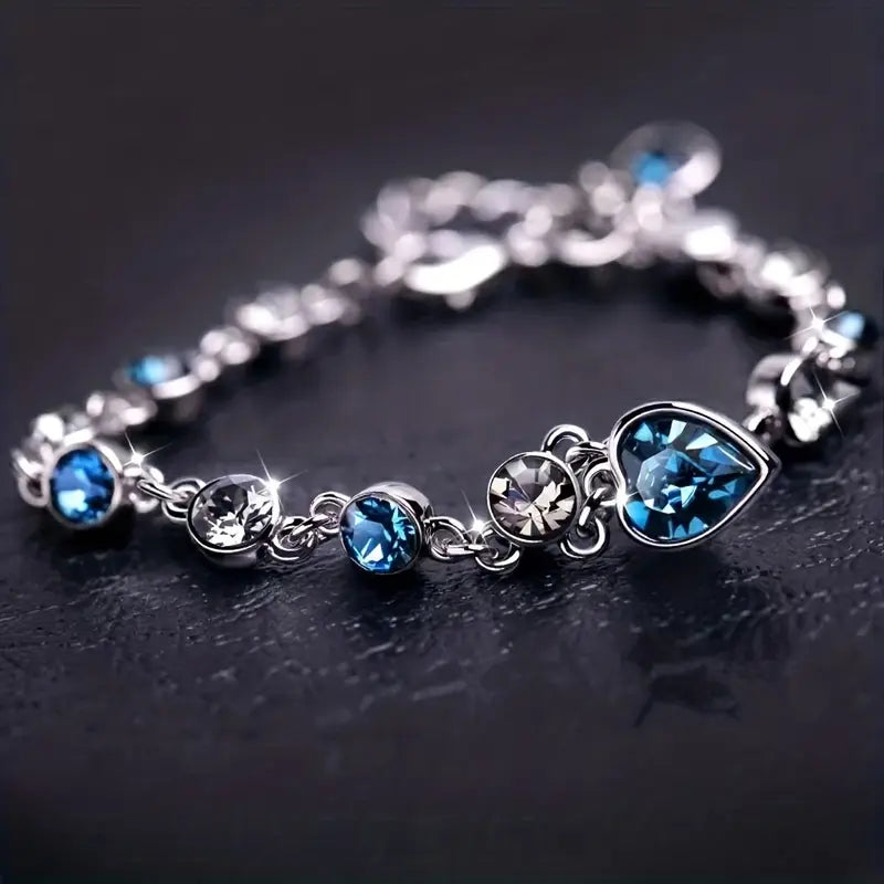 Zachte glans armband van wit goud met hartje