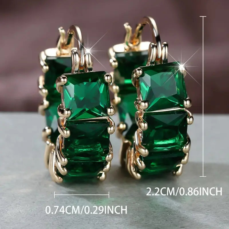 Elegante gouden oorbellen met subtiele zirkonia details