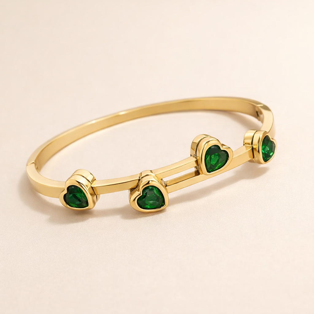 Verfijnde gouden armband met hartjes