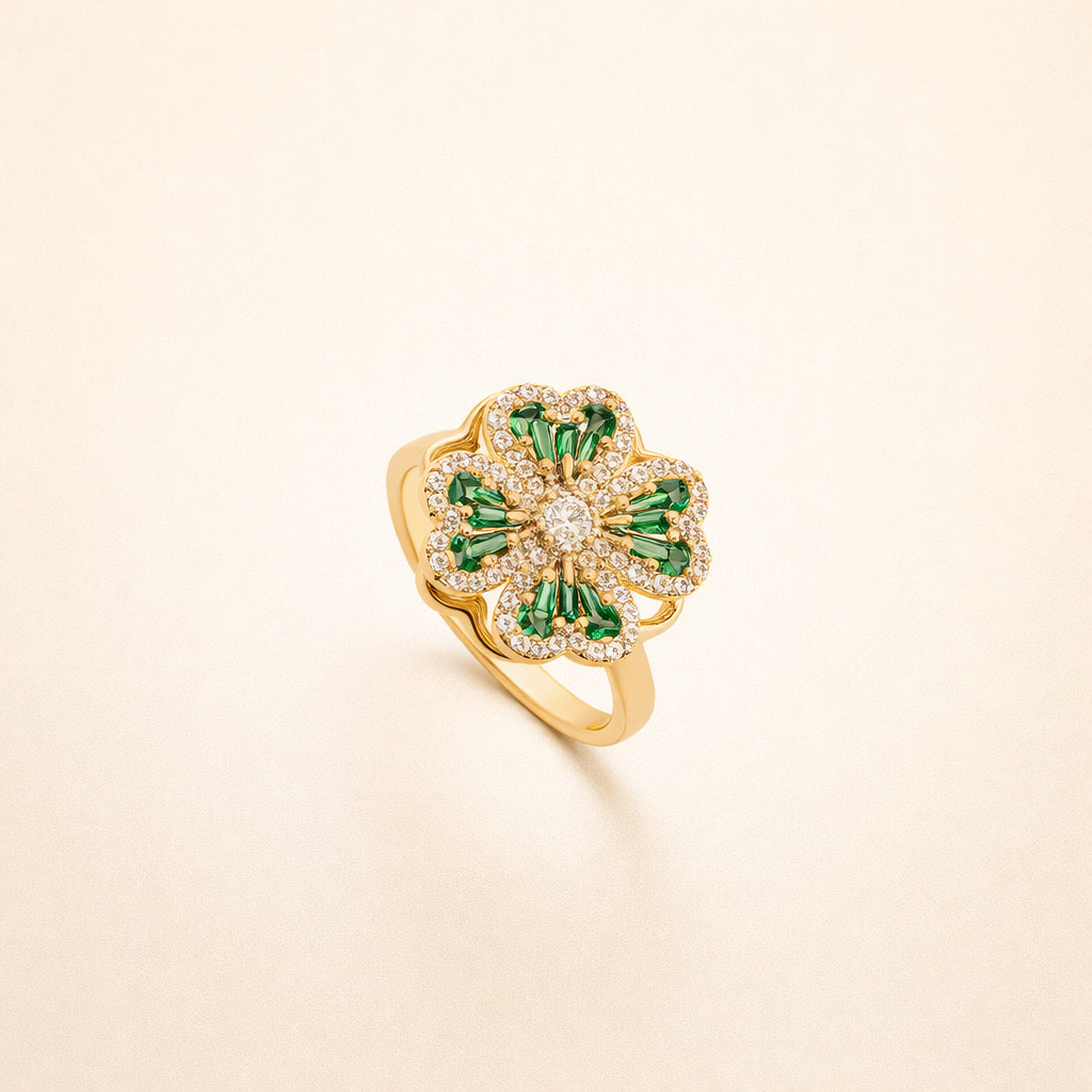 Elegante gouden ring met draaiende klaverblad