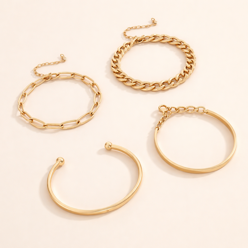 Elegante gouden armbandset met verfijnde details
