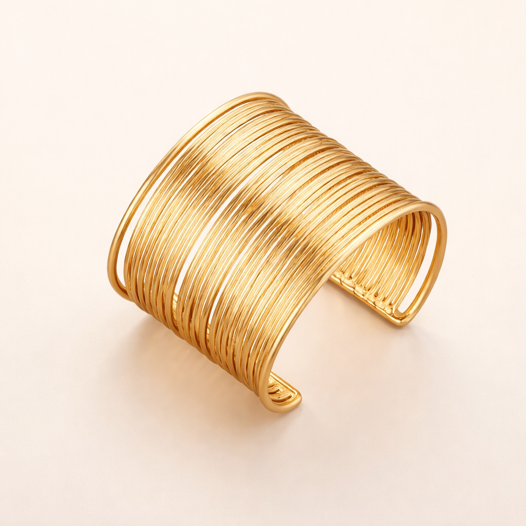 Elegante gouden armband met verfijnde vintage uitstraling