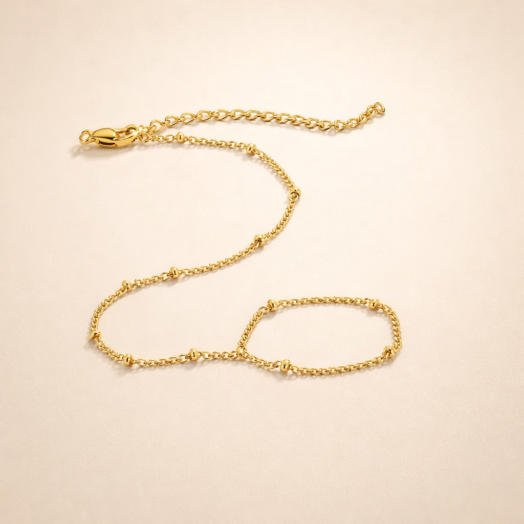 Elegante gouden armband met verfijnde details