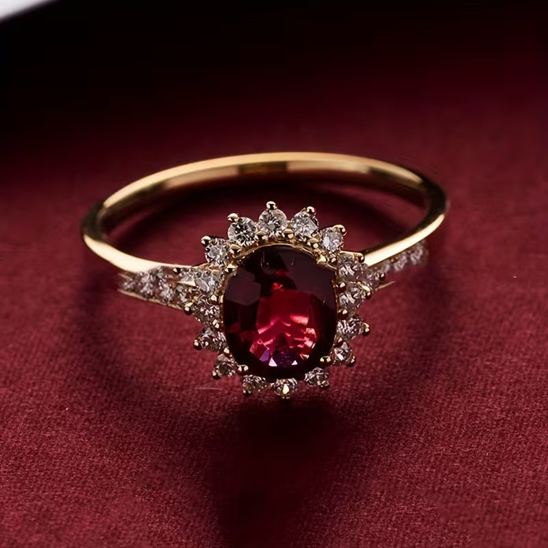 Elegante gouden ring met rode zirkonia
