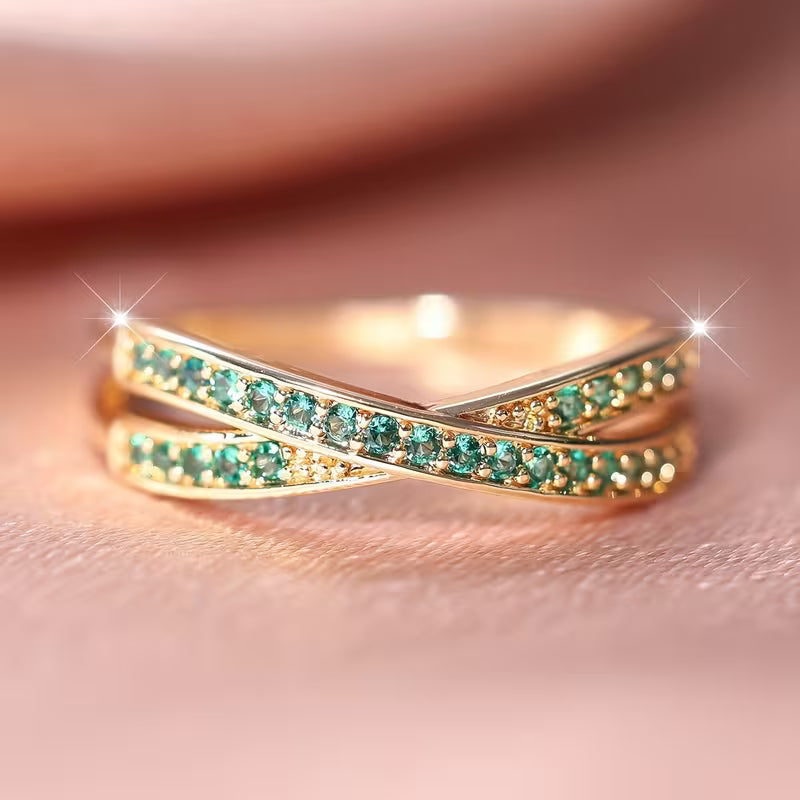 Verfijnde gouden ring met smaragd accent