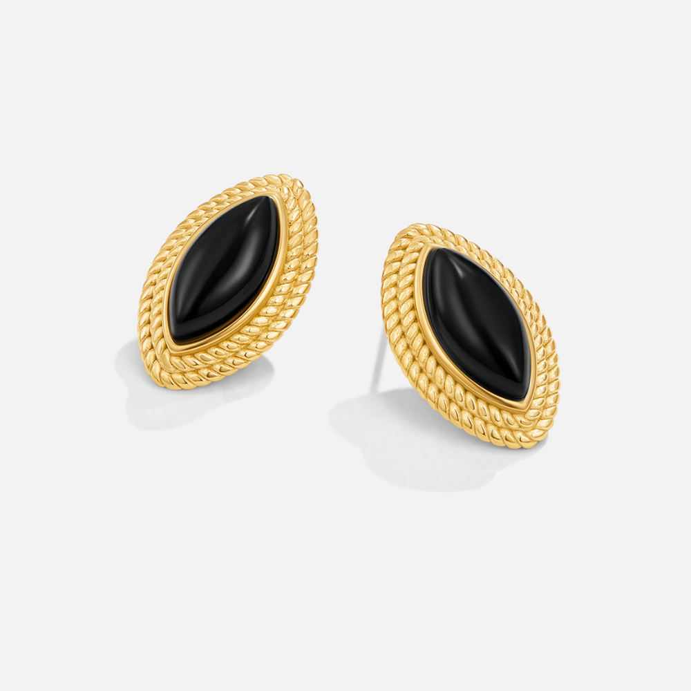 Elegante gouden oorbellen met zwarte accenten