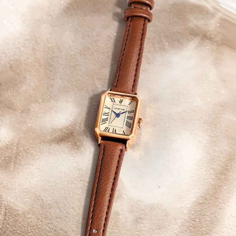 Elegante gouden horloge met een verfijnd steentje