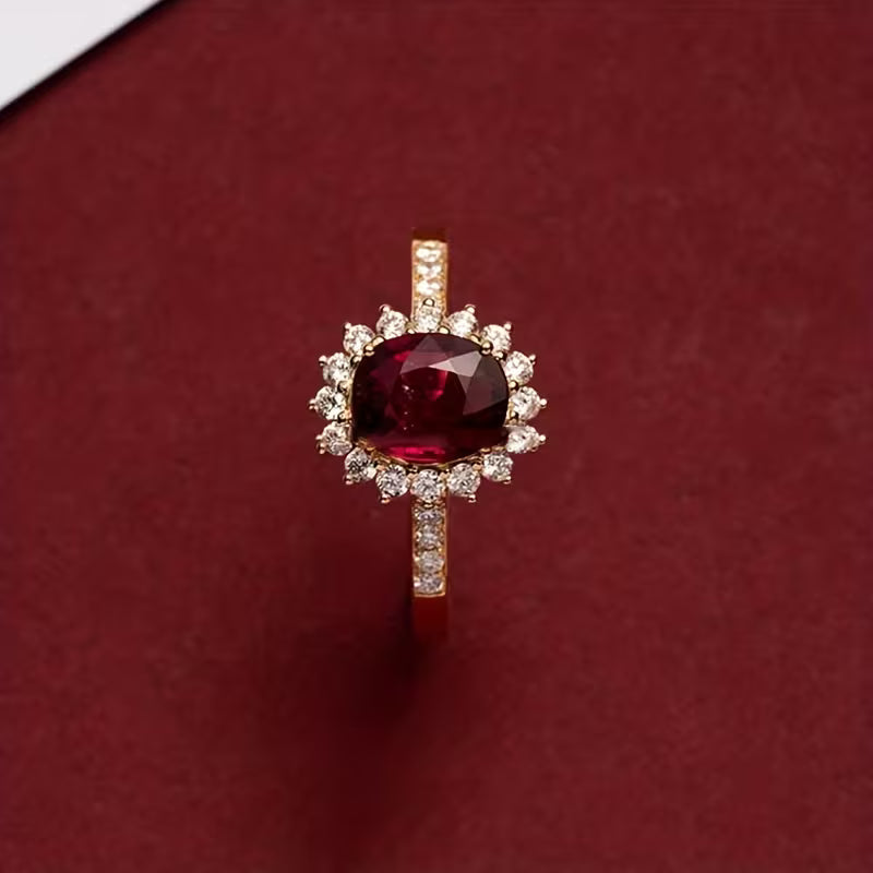 Elegante gouden ring met rode zirkonia