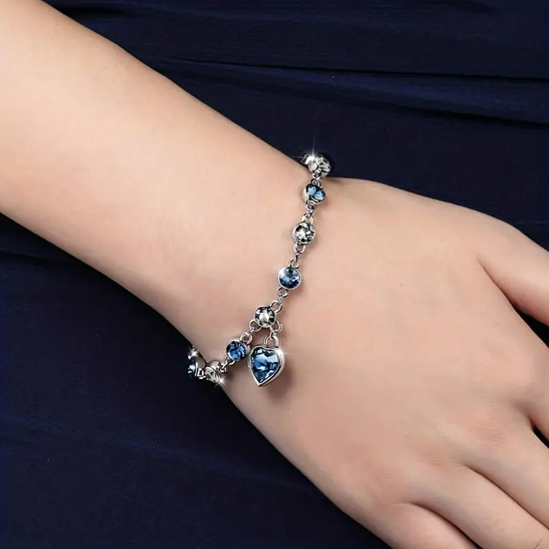Zachte glans armband van wit goud met hartje