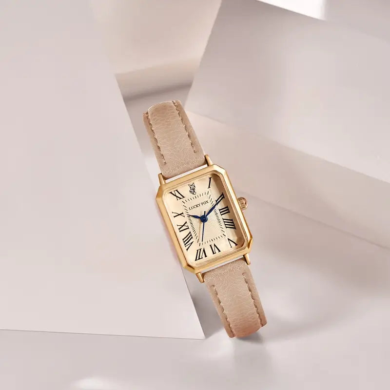 Elegante gouden horloge met een verfijnd steentje