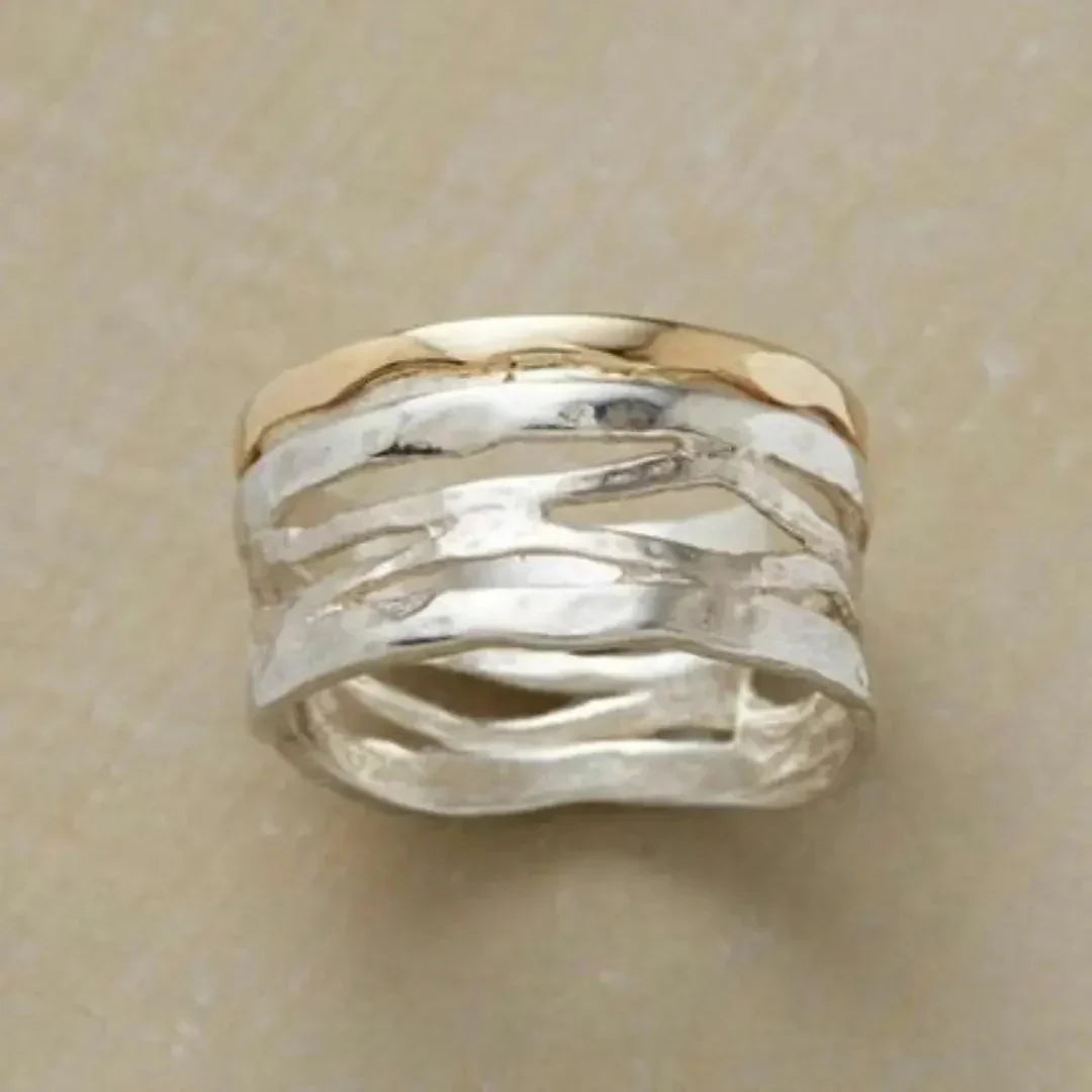 Elegante holle ring in goud en zilver