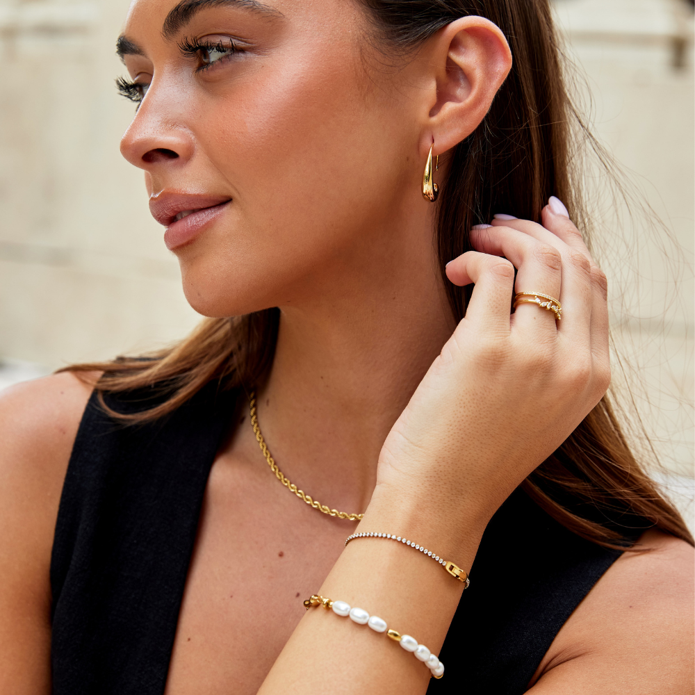 Elegante gouden armband met sprankelende kristallen