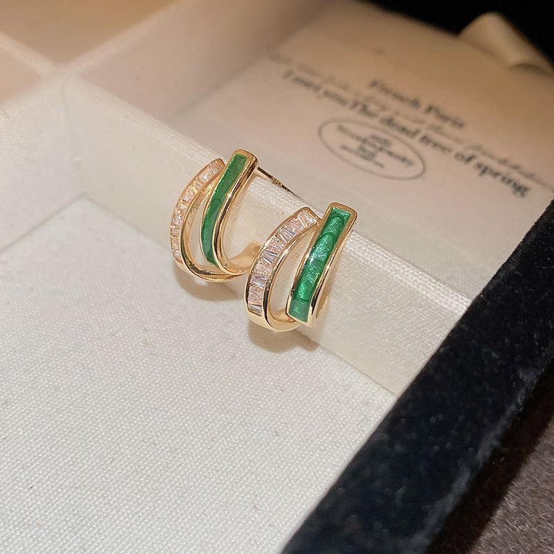 Elegante gouden oorbellen met bladeren