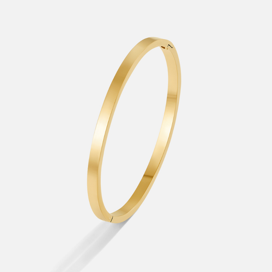 Elegante gouden armreif met verfijnde lijnen