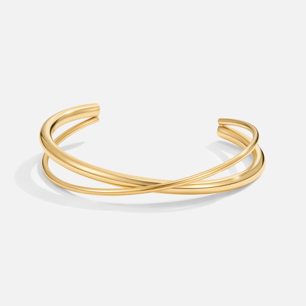 Elegante gouden armband met een verfijnde twist
