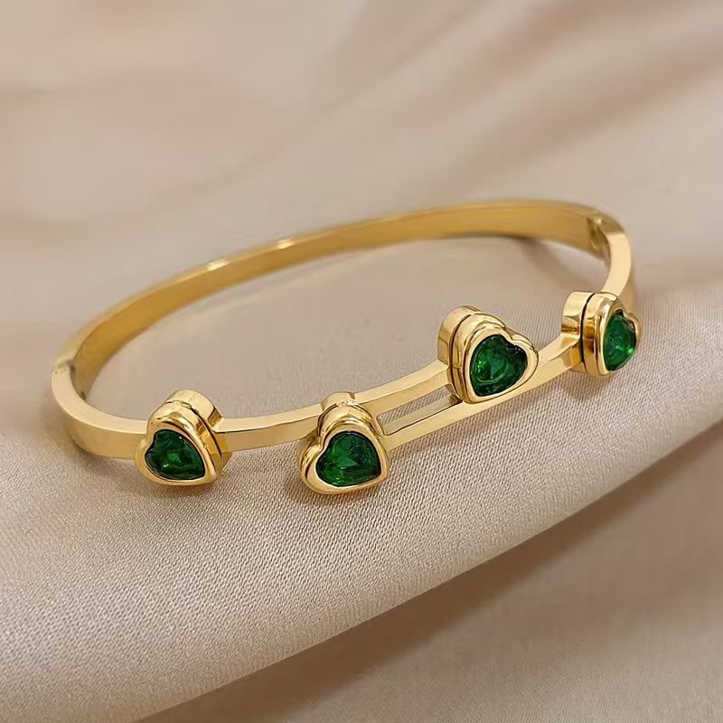 Verfijnde gouden armband met hartjes