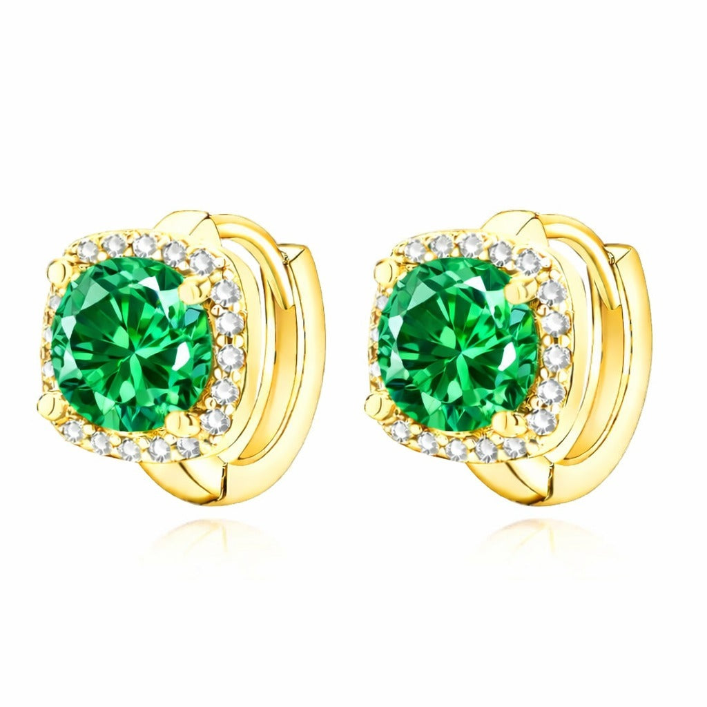 Elegante gouden oorbellen met smaragddetail