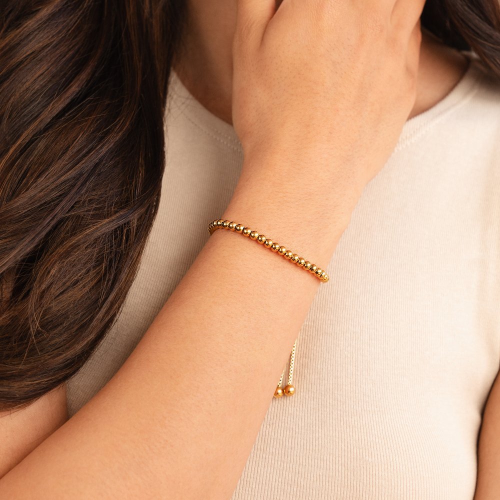 Elegante armband van goud met pareldetails