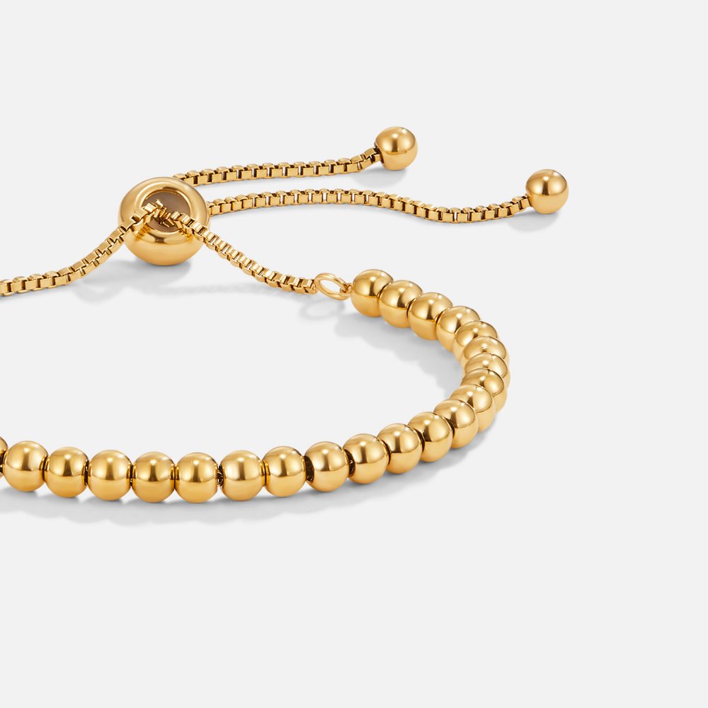 Elegante armband van goud met pareldetails