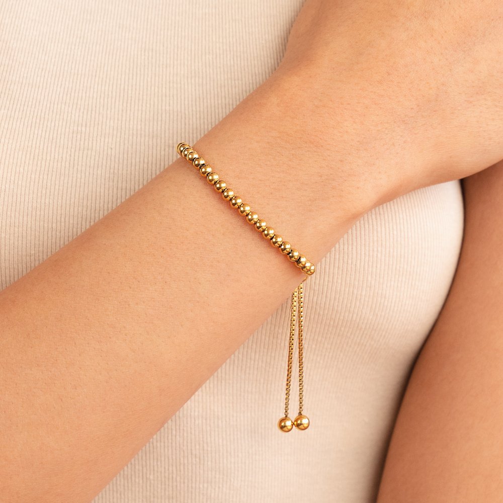 Elegante armband van goud met pareldetails