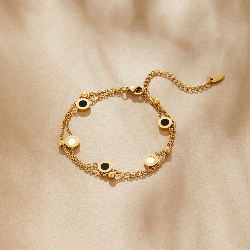 Elegante onyx en witte steen armband