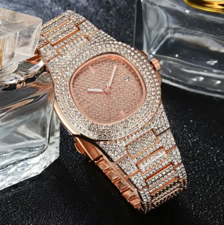 Elegante gouden horloge met subtiele parel