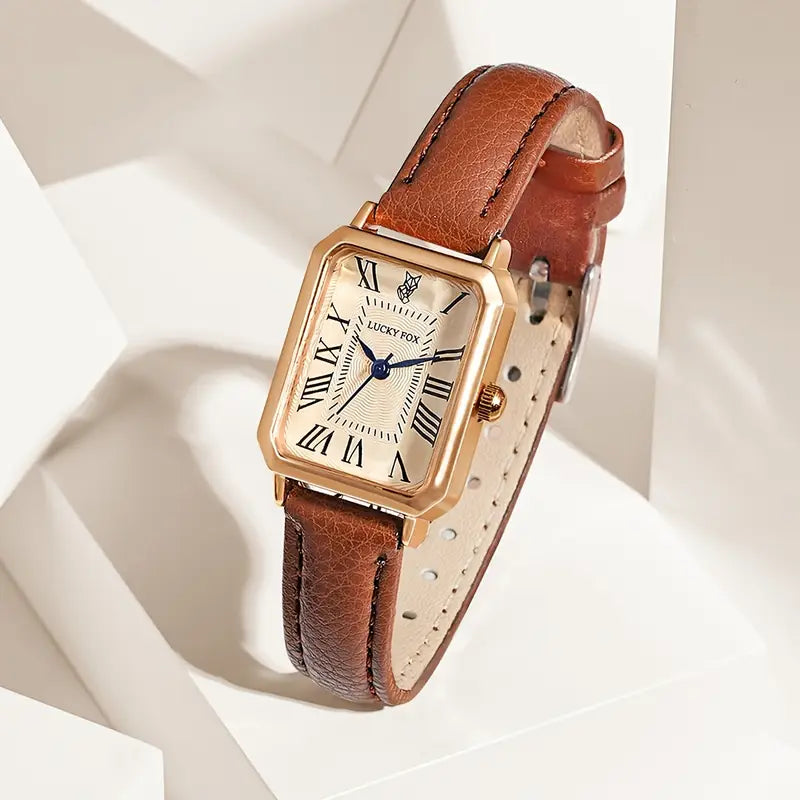 Elegante gouden horloge met een verfijnd steentje
