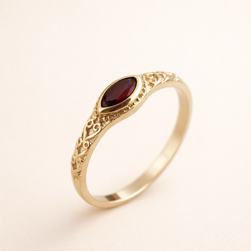 Elegante gouden ring met een rode zirkonia