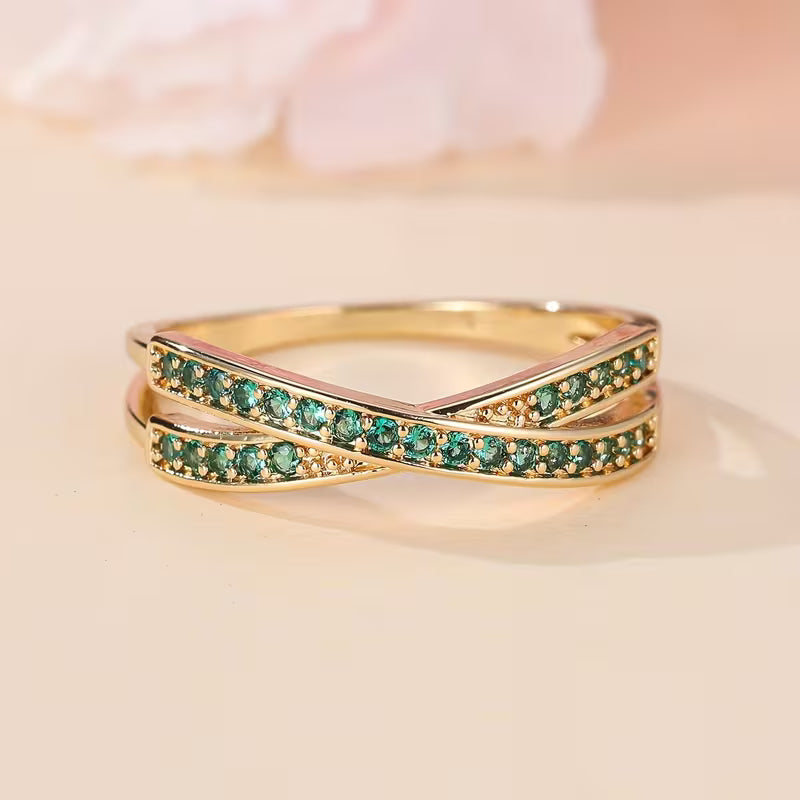 Verfijnde gouden ring met smaragd accent
