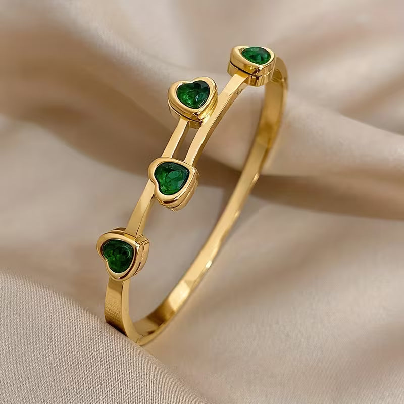 Verfijnde gouden armband met hartjes