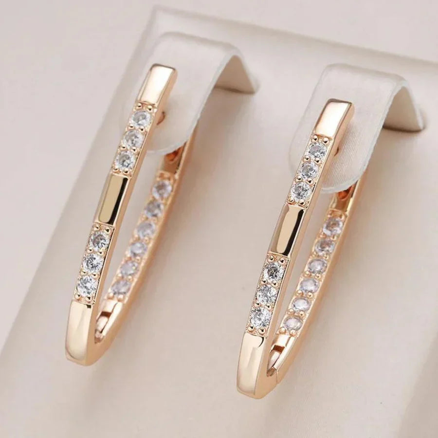 Elegante gouden oorbellen met sprankelende zirkonia