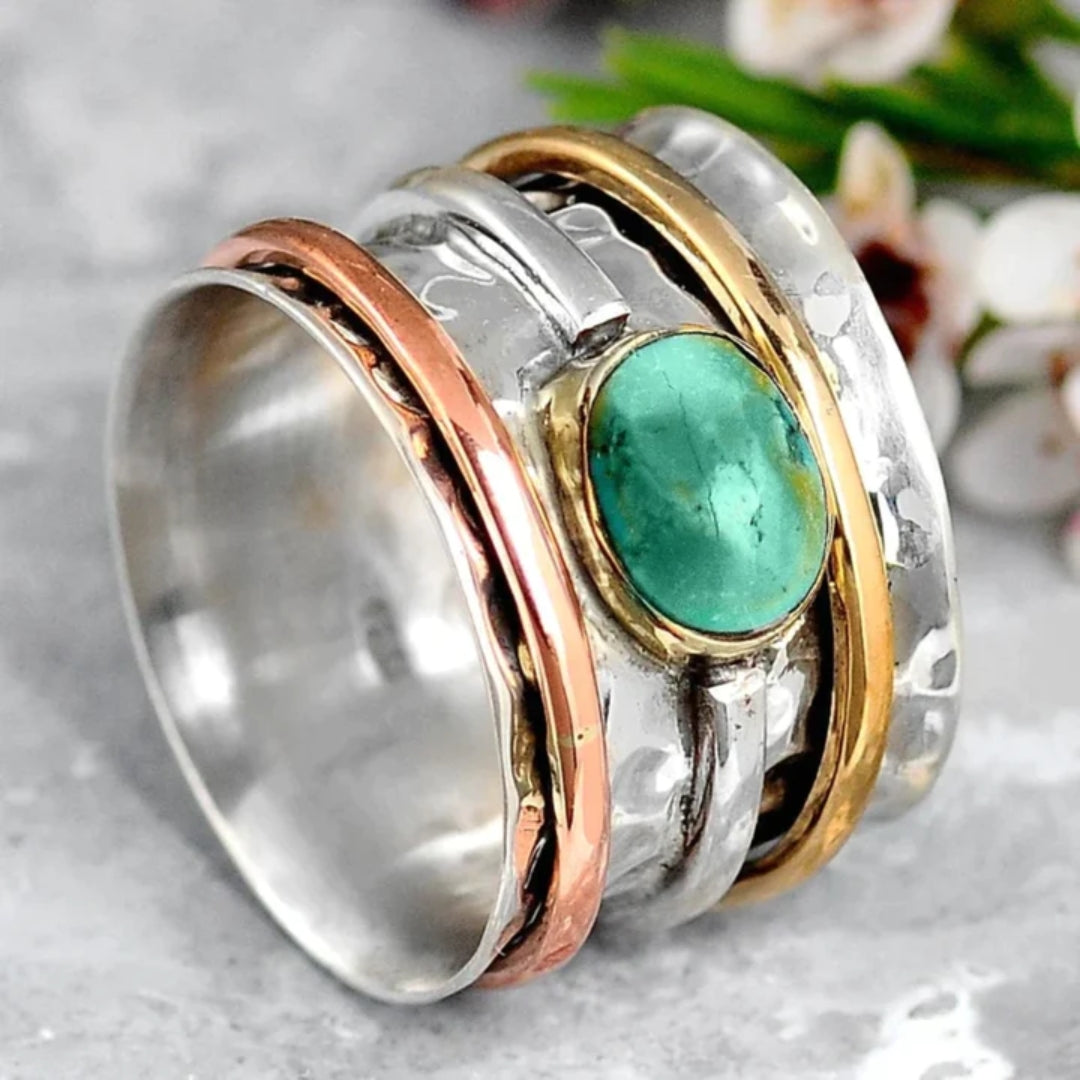 Elegante gouden ring met turkoois en verfijnde details