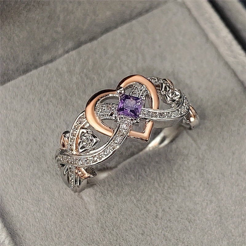 Elegante gouden en zilveren ring met hartje