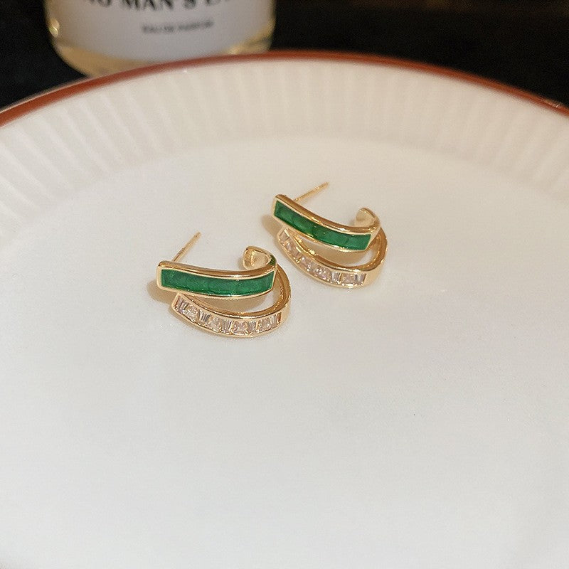 Elegante gouden oorbellen met bladeren