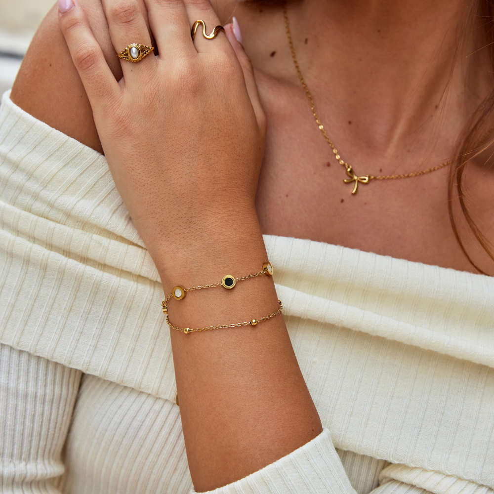 Elegante onyx en witte steen armband