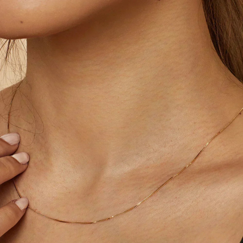 Eenvoudige gouden boxketting met verfijnde afwerking