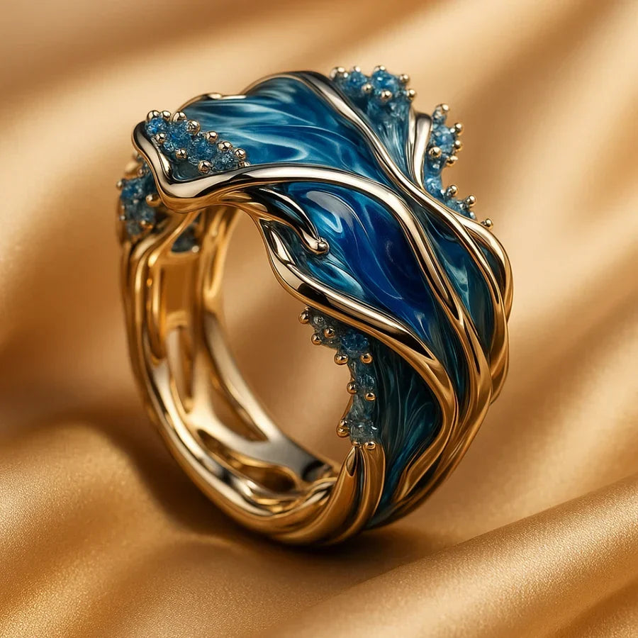 Elegante gouden ring met golfmotief