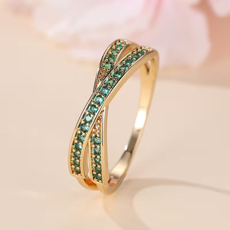 Verfijnde gouden ring met smaragd accent