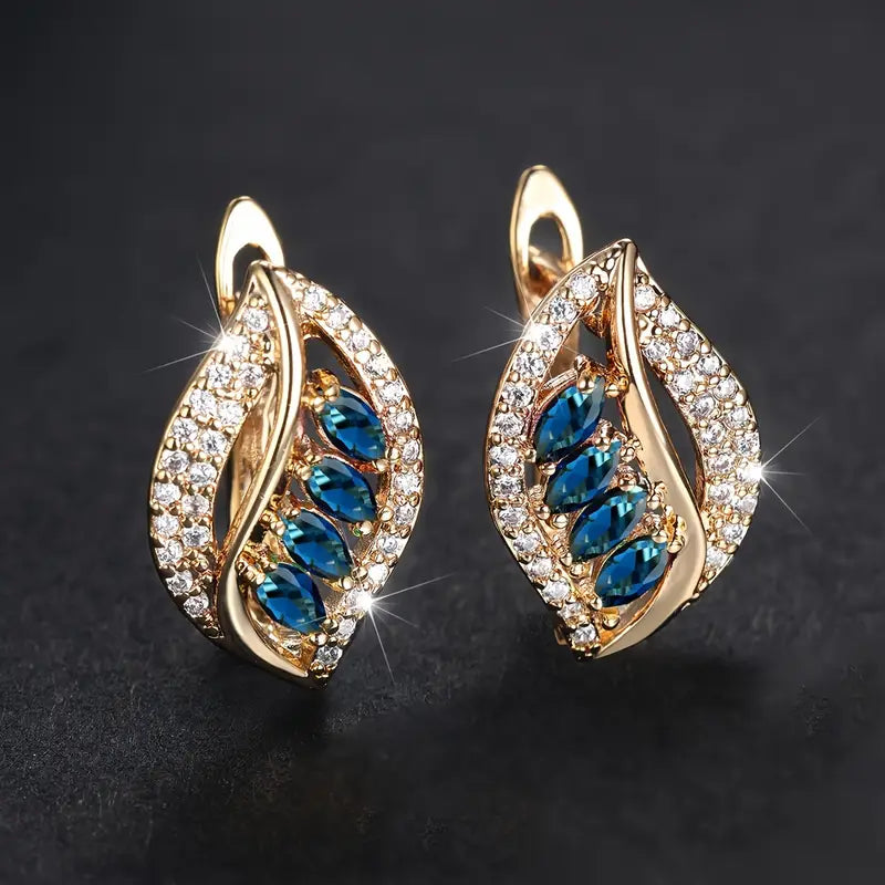 Ethereale gouden oorbellen met delicate zirkonia