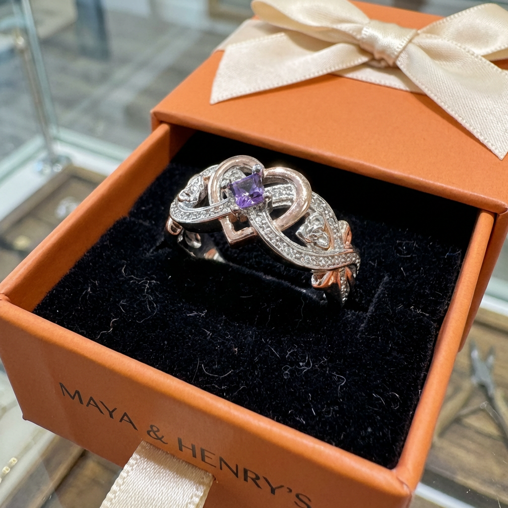 Elegante gouden en zilveren ring met hartje