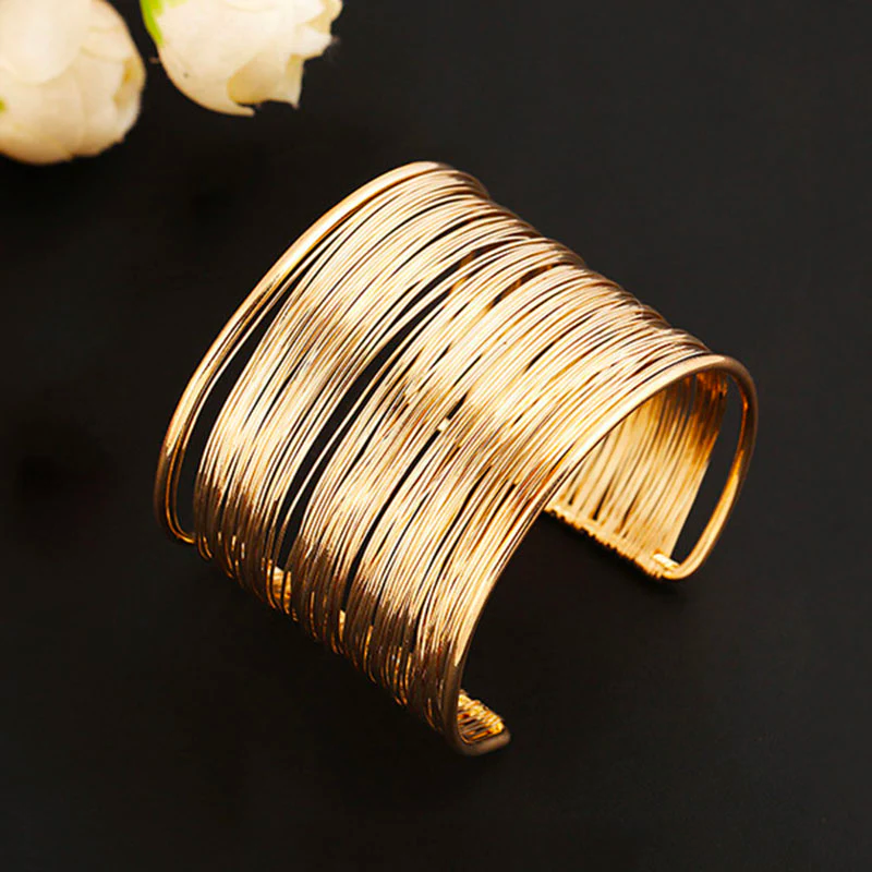 Elegante gouden armband met verfijnde vintage uitstraling