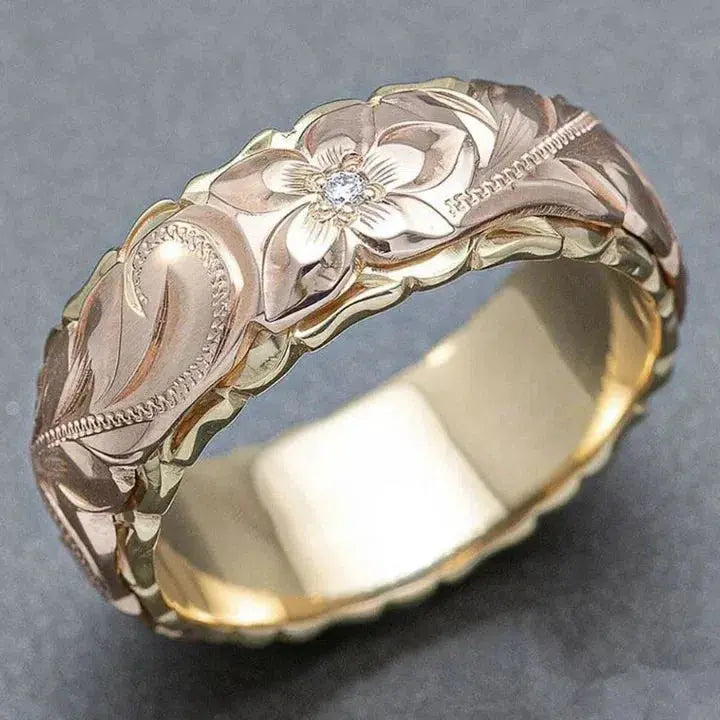 Elegante gouden ring met rozenbloem ontwerp