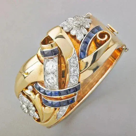 Elegante gouden ring met blauwe zirkonia