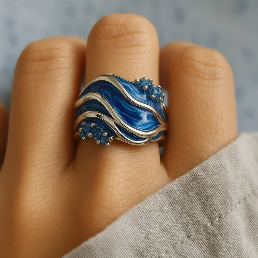 Elegante gouden ring met golfmotief