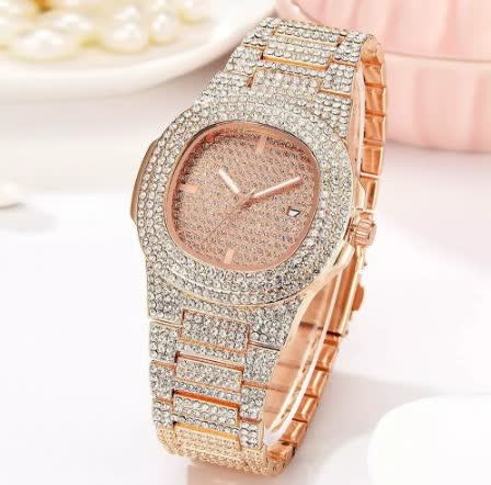 Elegante gouden horloge met subtiele parel